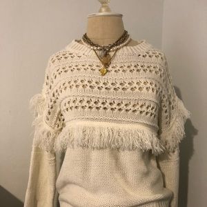 White fringed sweater